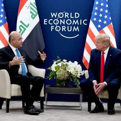 Iraqi president and Trump meet in Davos, discuss foreign troops cut