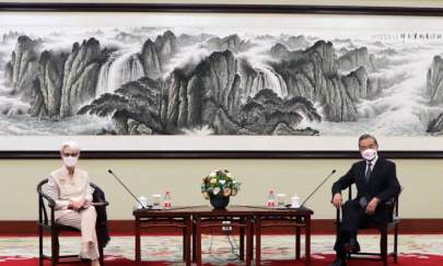 U.S. Deputy Secretary of State Wendy Sherman meets Chinese State Councilor and Foreign Minister Wang Yi in Tianjin, China in this handout picture released on July 26, 2021. (U.S. Department of State/Handout via Reuters)