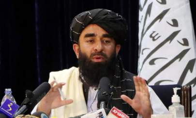 Taliban spokesman Zabihullah Mujahid speaks during a news conference in Kabul, Afghanistan, on Aug. 17, 2021. (Stringer/Reuters)