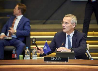 Photo: NATO Secretary General Jens Stoltenberg offers opening remarks at the meeting of NATO defense ministers on Oct. 21 at alliance headquarters in Brussels.