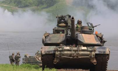 U.S. Army's M1A2 tank from 2nd Battalion, 9th Infantry Regiment of the 1st Armored Brigade Combat Team of 2nd infantry division participate in a river crossing exercise in Yeoncheon-gun, South Korea, on May 30, 2013. Chung Sung-Jun/Getty Images