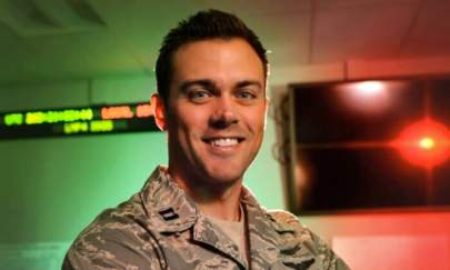 Capt. Matthew Lohmeier, 460th Operations Group Block 10 chief of training, stands in the Standardized Space Trainer on Buckley Air Force Base, Colo., on July 22, 2015. (Darren Scott/U.S. Air Force)