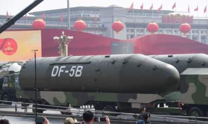 Military vehicles carrying DF-5B intercontinental ballistic missiles participate in a military parade at Tiananmen Square in Beijing on Oct. 1, 2019. (Greg Baker/AFP via Getty Images)