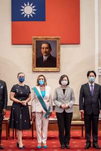 Speaker of the U.S. House Of Representatives Nancy Pelosi (D-CA), center left, poses for photographs after receiving the Order of Propitious Clouds with Special Grand Cordon, Taiwan’s highest civilian honour, from Taiwan’s President Tsai Ing-wen, center right, at the president’s office on August 03, 2022 in Taipei, Taiwan. (Chien Chih-Hung/Office of The President via Getty Images)