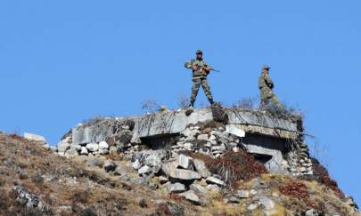 Indian Army personnel keep vigilance at Bumla pass at the India-China border in Arunachal Pradesh on Oct. 21, 2012. According to Indian media reports, the Chinese have built 1010 houses, 2.5 miles inside the Indian territory in an area inside Arunachal Pradesh. (BIJU BORO/AFP via Getty Images)