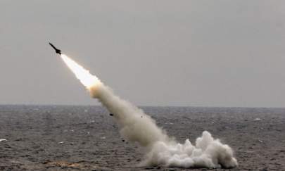 A Chinese submarine launches a missile in an offshore blockade exercise during the third phase of the Sino-Russian "Peace Mission 2005" joint military exercise, held Aug. 23, 2005 near China's Shandong Peninsula. (China Photos/Getty Images)