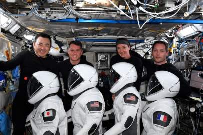 The four astronauts of NASA and SpaceX's Crew-2 mission pose with their launch and entry suits as they wrap up a six-month mission to the International Space Station. They are: (from left) Akihiko Hoshide of the Japan Aerospace Exploration Agency, Shane Kimbrough and Megan McArthur of NASA and Thomas Pesquet of European Space Agency. (Image credit: ESA/Thomas Pesquet via Twitter)