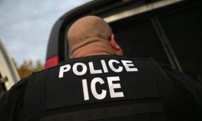 An Immigration and Customs Enforcement (ICE) agent in Los Angeles, Calif., on Oct. 14, 2015. (John Moore/Getty Images)