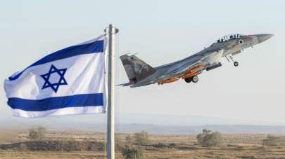  File photo: an Israeli Air Force F-15 Eagle fighter plane performs at an air show during the graduation of new cadet pilots at Hatzerim base in the Negev desert, on June 29, 2017. Photo: Jack Guez/AFP