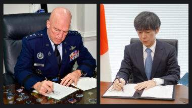 Chief of Space Operations Gen. John “Jay” Raymond (left) and an official with Japan’s Office of National Space Policy sign a December 2020 memorandum of understanding. Credits: U.S. Air Force/ Cabinet Office, Japan