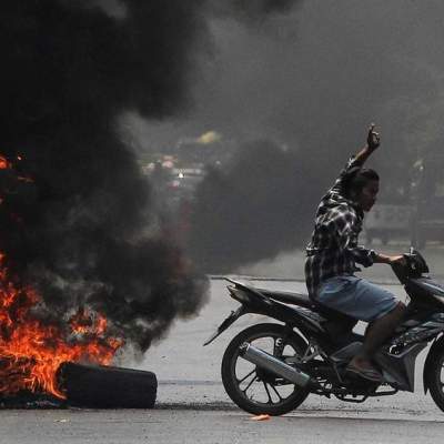 Myanmar protesters burn military’s constitution