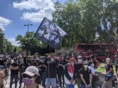 A protester waves a pro-Hong Kong independence flag in London. June 12th, 2021. (Kurt Zindulka, Breitbart News)