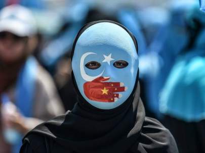 china-uighur-muslim-persecution-east-turkestan-flag-getty-640x480