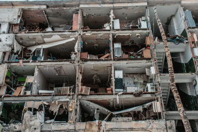 A view of destroyed apartments damaged by shelling in Kharkiv, Ukraine, Sunday, March 13, 2022.  (AP Photo/Andrew Marienko)