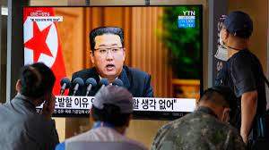 People watch a TV screen showing North Korean leader Kim Jong Un in a news program, at Seoul Railway Station in Seoul, South Korea, Sept. 30, 2021.