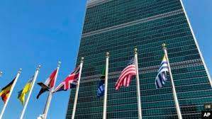 AP - Flags of some member countries fly outside the United Nations headquarters building in New York, Sept. 28, 2019.