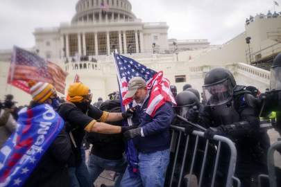 The more than 100-page Senate report and its 20 recommendations reflect a bipartisan congressional investigation of the Jan. 6 Capitol riot. PHOTO: JOHN MINCHILLO/ASSOCIATED PRESS