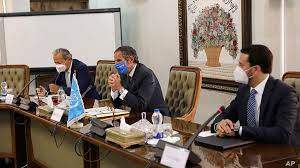 AP - Rafael Mariano Grossi, Director General of International Atomic Energy Agency, IAEA, center, attends a meeting with the Head of Atomic Energy Organization of Iran, Mohammad Eslami, in Tehran, Iran, Sept. 12, 2021