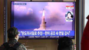 People watch a North Korean missile launch on a television at the Seoul Railway Station in Seoul, South Korea, on Jan. 5, 2022. (Image credit: Chung Sung-Jun/Getty Images)