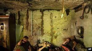 AP - Ukrainian servicemen rest in a basement between fightings with Russian forces at the frontline in Kharkiv region, Ukraine, July 27, 2022.