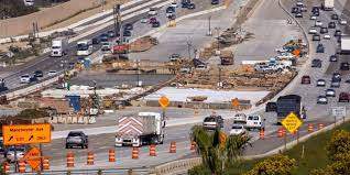 Work crews continue to work on the construction of a freeway overpass in Encinitas, Calif. PHOTO: MIKE BLAKE/REUTERS