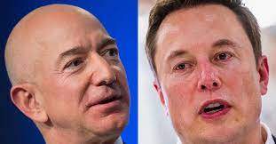 Jeff Bezos, left, and Elon Musk. Philip Pacheco and Jim Watson/Getty Images