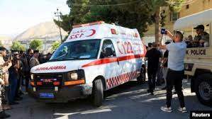 An ambulance transports a coffin of an Iraqi who was killed the previous day in what Iraqi officials claim was a Turkish attack on a mountain resort in Iraq's northern province of Dohuk, July 21, 2022.