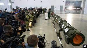 AP - Foreign military attaches and journalists attend a briefing by the Russian Defense Ministry about the 9M729 land-based cruise missile, right, in Kubinka, Russia, Jan. 23, 2019.